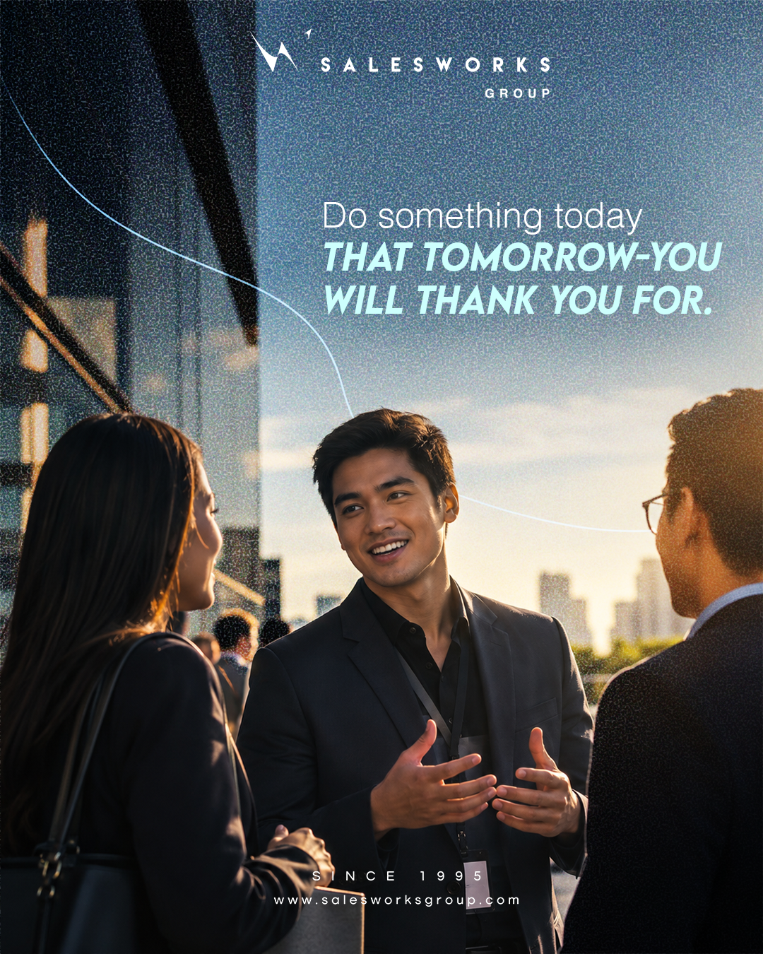 Salesworks poster of colleagues talking outdoors with the line Do something today that tomorrow-you will thank you for